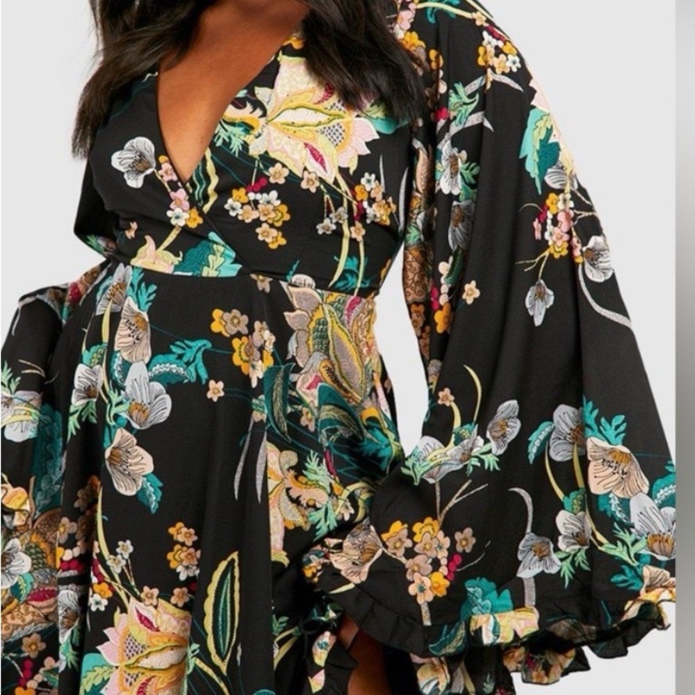 Boohoo plus black floral dress with bell sleeves.